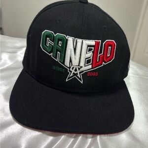 Black Cap with Red, Green, and White Accents